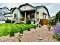 Beautiful landscaping surrounds this two story home at 4468 Sidewinder Loop, Castle Rock, CO 80108