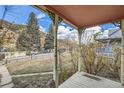 Front porch view of street and mountain scenery at 2507 Miner St, Idaho Springs, CO 80452