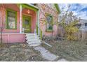 Front porch view of a Victorian home at 2507 Miner St, Idaho Springs, CO 80452