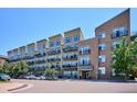 Exterior view of The Lofts building, multi-story condo at 7240 W Custer Ave # 407, Lakewood, CO 80226