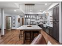 Basement kitchen with an island and stainless steel appliances at 4532 Shoshone Dr, Larkspur, CO 80118