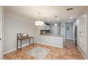 Dining area with view into the kitchen at 12281 E Tennessee Dr # 303, Aurora, CO 80012