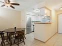 Well-equipped kitchen with ample cabinet space and stainless steel appliances at 2696 E Otero Pl # 1, Centennial, CO 80122