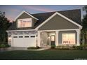 Two-story home with gray siding, stone accents, and dormer windows at 374 Josef Cir, Fort Lupton, CO 80621