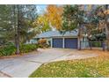 Ranch-style home with a two-car attached garage at 2635 S Lamar Way, Lakewood, CO 80227