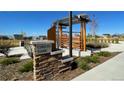 Orion Park with modern pergola and stone seating area at 738 N Clubview St, Watkins, CO 80137