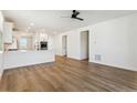 Spacious living room with hardwood floors and ceiling fan at 42996 Colonial Trl, Elizabeth, CO 80107