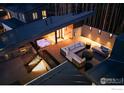 Relaxing rooftop deck with hot tub and outdoor seating at 119 Boulder Cir, Breckenridge, CO 80424