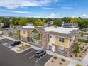 Aerial view of modern building with parking at 270 S Cherrywood Dr # 101, Lafayette, CO 80026