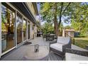 Spacious deck with patio furniture and access to the backyard at 2870 18Th St, Boulder, CO 80304