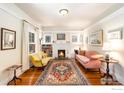 Living room featuring a fireplace and hardwood floors at 945 Lincoln Pl, Boulder, CO 80302