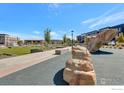 Community park with playground, open green space, and seating areas at 682 Central Park Cir, Superior, CO 80027