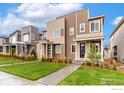 Modern townhouse with neutral color scheme at 9673 Truckee St, Commerce City, CO 80022