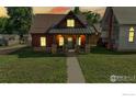 Evening view of charming craftsman home at 730 6Th St, Berthoud, CO 80513