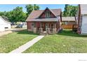 Another wide view of craftsman home and yard at 730 6Th St, Berthoud, CO 80513