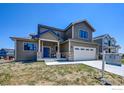 Two-story home with a stone facade and modern design at 958 Eldorado Ln, Louisville, CO 80027
