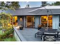 Private deck with outdoor furniture, overlooking scenic views at 271 Anemone Dr, Boulder, CO 80302