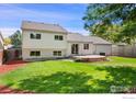 Spacious backyard with patio and lawn at 177 S Polk Ave, Louisville, CO 80027