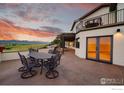 Outdoor patio with seating area and mountain views at 8758 W Phillips Rd, Boulder, CO 80301