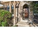 Front entrance with stonework and a wooden door at 3766 Ridgeway St, Boulder, CO 80301