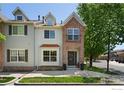 Attractive two-story townhome with brick and siding at 1234 S Emery St # H, Longmont, CO 80501