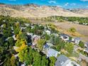 Aerial view of a residential neighborhood with solar panels at 1095 Quince Ave, Boulder, CO 80304