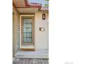 Front entrance with modern door and small patio at 3720 Cloverleaf Dr, Boulder, CO 80304