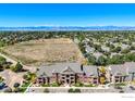 Aerial view of townhomes and open space at 804 Summer Hawk Dr # 8105, Longmont, CO 80504