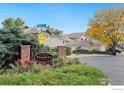 Entrance to The Meadows community featuring landscaping and signage at 1226 Atwood St, Longmont, CO 80501