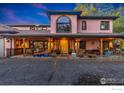 Two-story house exterior with front porch and landscaping at 1600 17Th Ave, Longmont, CO 80501