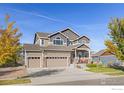 Two-story house with three-car garage at 514 Mount Rainier St, Berthoud, CO 80513