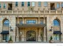 Ornate building entrance with a grand gate and stone facade at 475 W 12Th Ave # 7E, Denver, CO 80204