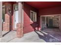 Attached garage with entrance to home and ample parking space at 818 S Terry St # 85, Longmont, CO 80501