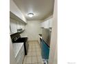 Condo kitchen with stainless steel appliances and marble countertops at 2707 Valmont Rd # 116, Boulder, CO 80304