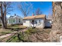 Charming bungalow with mature landscaping at 1709 Arapahoe Ave, Boulder, CO 80302