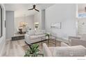 Open concept living and dining area with hardwood floors at 612 S Bermont Ave, Lafayette, CO 80026