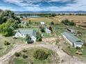 Aerial view of a house and farm buildings at 14619 N 115Th St, Longmont, CO 80504