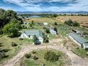 Aerial view of a ranch home with mountain views and spacious grounds at 14619 N 115Th St, Longmont, CO 80504