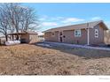 Ranch style home with attached shed and propane tank at 2981 W 144Th Ave, Broomfield, CO 80023