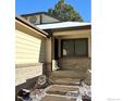 Front entrance with steps leading to the home's entryway at 11285 E Baltic Pl, Aurora, CO 80014