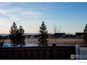 Backyard view showcasing mountain views and open space at 20411 E 53Rd Ave, Denver, CO 80249