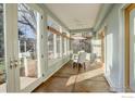 Bright sunroom features a table and chairs, perfect for relaxing at 1455 Chestnut Pl, Boulder, CO 80304