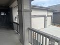 Front porch view of house and driveway at 4639 Clear Creek Dr, Firestone, CO 80504