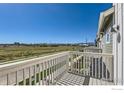 Private balcony overlooks open space and distant mountains at 2848 South Flat Cir, Longmont, CO 80503
