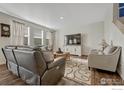 Spacious living room with comfortable seating and large TV at 2262 Monte Vista St, Fort Lupton, CO 80621
