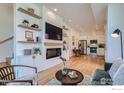 Open concept living space with kitchen and fireplace at 1998 Foxtail Ln # B, Lafayette, CO 80026