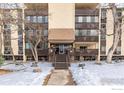 Building exterior showcasing a classic design and landscaping at 7020 E Girard Ave # 107, Denver, CO 80224