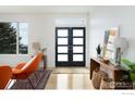 Bright and airy entryway with modern double doors at 514 Granite Dr, Boulder, CO 80302