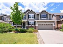 Two story home with landscaping, driveway and attached garage at 17456 Quarry Way, Monument, CO 80132