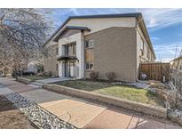 Contemporary style building exterior, featuring a clean design and landscaping at 2460 W Caithness Pl # 104, Denver, CO 80211
